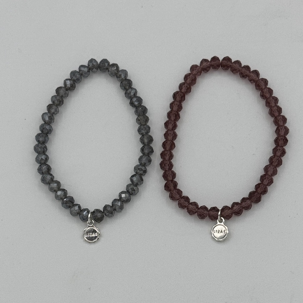 Lizas set of 2 stretch bracelets faceted beads rose/blue gray tone.